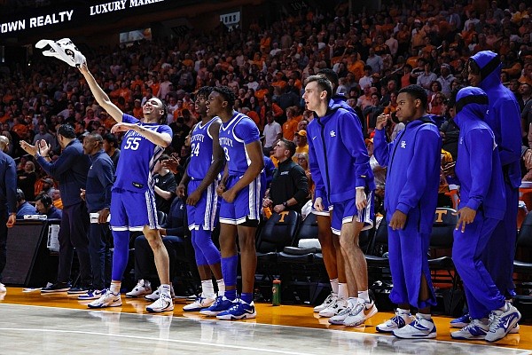 Kentucky players celebrate on the bench during the second half of an NCAA college basketball game against Tennessee, Saturday, Jan. 14, 2023, in Knoxville, Tenn. (AP Photo/Wade Payne)