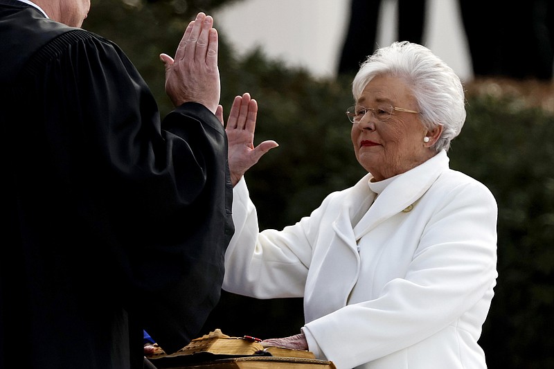 Governor Kay Ivey is sworn in as the 54th Governor of Alabama during a ceremony on the steps of the Alabama State Capital Monday, Jan. 16, 2023, in Montgomery, Ala. (AP Photo/Butch Dill)