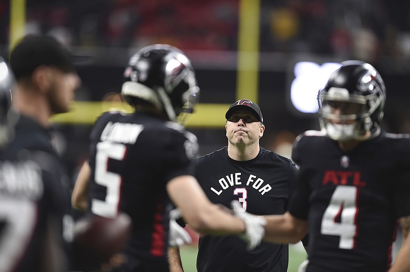 Atlanta Falcons head coach Arthur Smith looks up during warm ups before an NFL football game against the Tampa Bay Buccaneers, Sunday, Jan. 8, 2023, in Atlanta. (AP Photo/Hakim Wright Sr.)