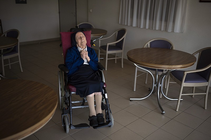 Sister Andre poses for a portrait at the Sainte Catherine Laboure care home in April 2022 in Toulon, southern France. The French nun died at 118 in her sleep early Tuesday.
(AP/Daniel Cole)