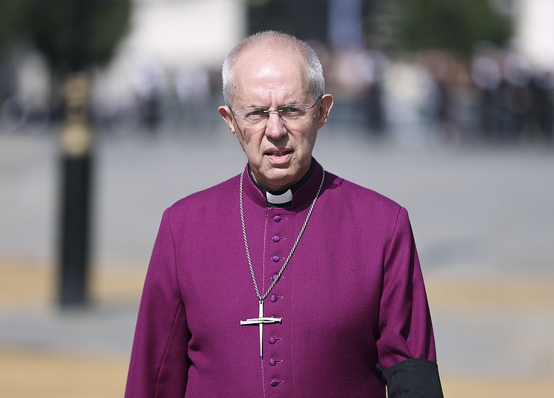 FILE - The Archbishop of Canterbury Justin Welby walks in Westminster on Sept. 14, 2022. The Church of England said Wednesday, Jan. 18, 2023, it will allow blessings for same-sex, civil marriages for the first time — but its position on gay marriage will not change and same-sex couples will still not be able to marry in its churches. The plans, to be outlined in a report to the General Synod, which meets in London next month, came after five years of debate and consultation on the church's position on sexuality. (Richard Heathcote/Pool Photo via AP)