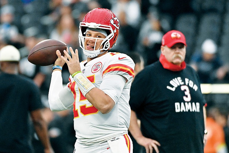 Chiefs quarterback Patrick Mahomes warms up prior to the regular-season finale earlier this month against the Raiders in Las Vegas. (Associated Press)