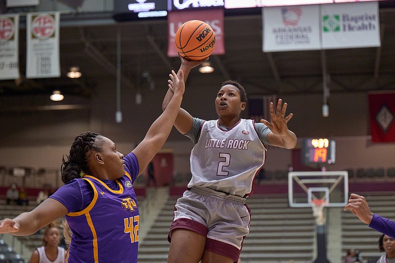 UALR forward Sali Kourouma puts up a shot Thursday while being defended by Tennessee Tech forward Kiera Hill during the Trojans’ 61-45 victory over the Golden Eagles at the Jack Stephens Center. Kourouma finished with a game-high 22 points.
(UALR Athletics/Mark Wagner)