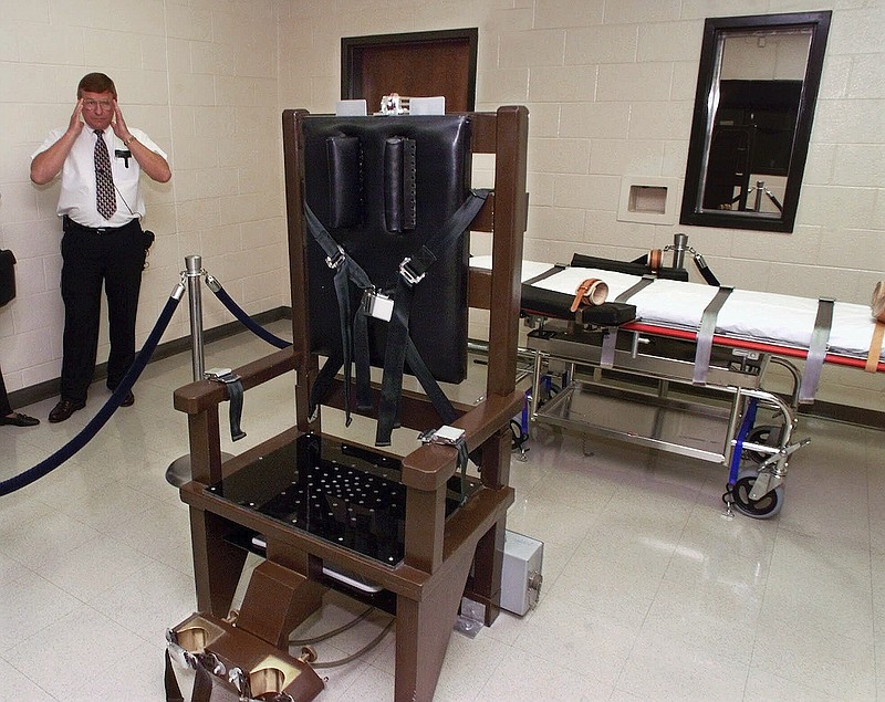 The execution chamber of the Riverbend Maximum Security Institution prison in Nashville, Tenn., is seen on Oct. 13, 1999. The Tennessee Department of Correction has fired its longtime top attorney and another employee following an independent report on failures within the state's lethal injection system. Debbie Inglis, the deputy commissioner and general counsel, and Kelly Young, the inspector general, received notices of “expiration of your executive service appointment” on Dec. 27, 2022, according to documents obtained by The Associated Press through public records requests. (AP Photo/Mark Humphrey, File)
