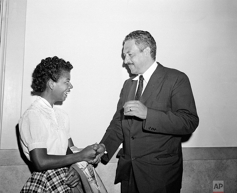 Thurgood Marshall talks with Elizabeth Eckford, 15, in the corridor of the federal courthouse at Little Rock, Ark., Sept. 7, 1957, on the day of a hearing on the desegregation of Central High School. On Sept. 2, Elizabeth was the first Black student to attempt to enter the school, only to be turned back by armed National Guard troops.
(AP)