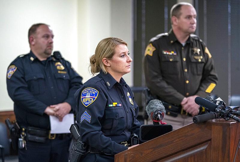 Evansville Police spokeswoman Sgt. Anna Gray address the media during a press conference, Friday afternoon, Jan. 20, 2023, related to the ongoing investigation of a shooting at the West Side Walmart in Evansville, Ind. (MaCabe Brown/Evansville Courier & Press via AP)