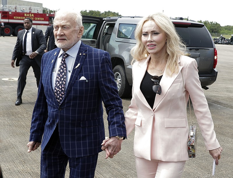 Apollo 11 astronaut Buzz Aldrin, left, and Anca Faur arrive at the Kennedy Space Center for a visit in recognition of the Apollo 11 moon landing anniversary, on July 20, 2019, in Cape Canaveral, Fla. Astronaut Edwin “Buzz” Aldrin announced on Facebook that he has married Anca Faur, his “longtime love” in a small ceremony in Los Angeles on Friday, Jan. 20, 2023, which was his 93rd birthday.(AP Photo/John Raoux, File)