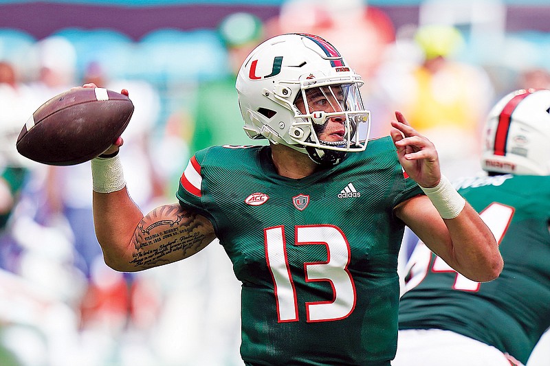 In this Oct. 22, 2022, file photo, Jake Garcia throws a pass for Miami (Fla.) during a game against Duke in Miami Gardens, Fla. (Associated Press)