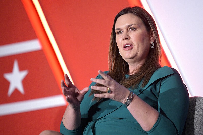 FILE - Then-Arkansas Gov.-elect Sarah Huckabee Sanders answers a question while taking part in a panel discussion during a Republican Governors Association conference on Nov. 16, 2022, in Orlando, Fla. (AP/Phelan M. Ebenhack, File)