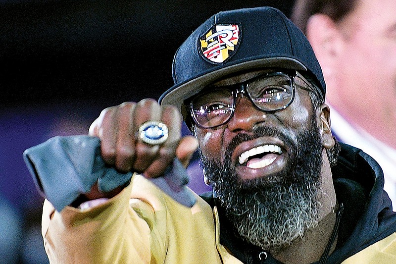 In this Nov. 3, 2019, file photo, former Ravens safety Ed Reed displays his Pro Football Hall of Fame ring during a halftime ceremony in Baltimore. (Associated Press)