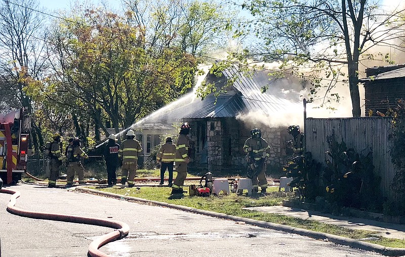 The Hot Springs Fire Department works a structure fire in the 600 block of School Street on Nov. 13, 2022. - File photo by The Sentinel-Record