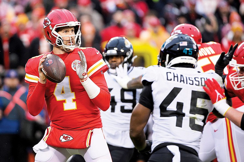 Kansas City Chiefs quarterback Chad Henne looks to pass during the