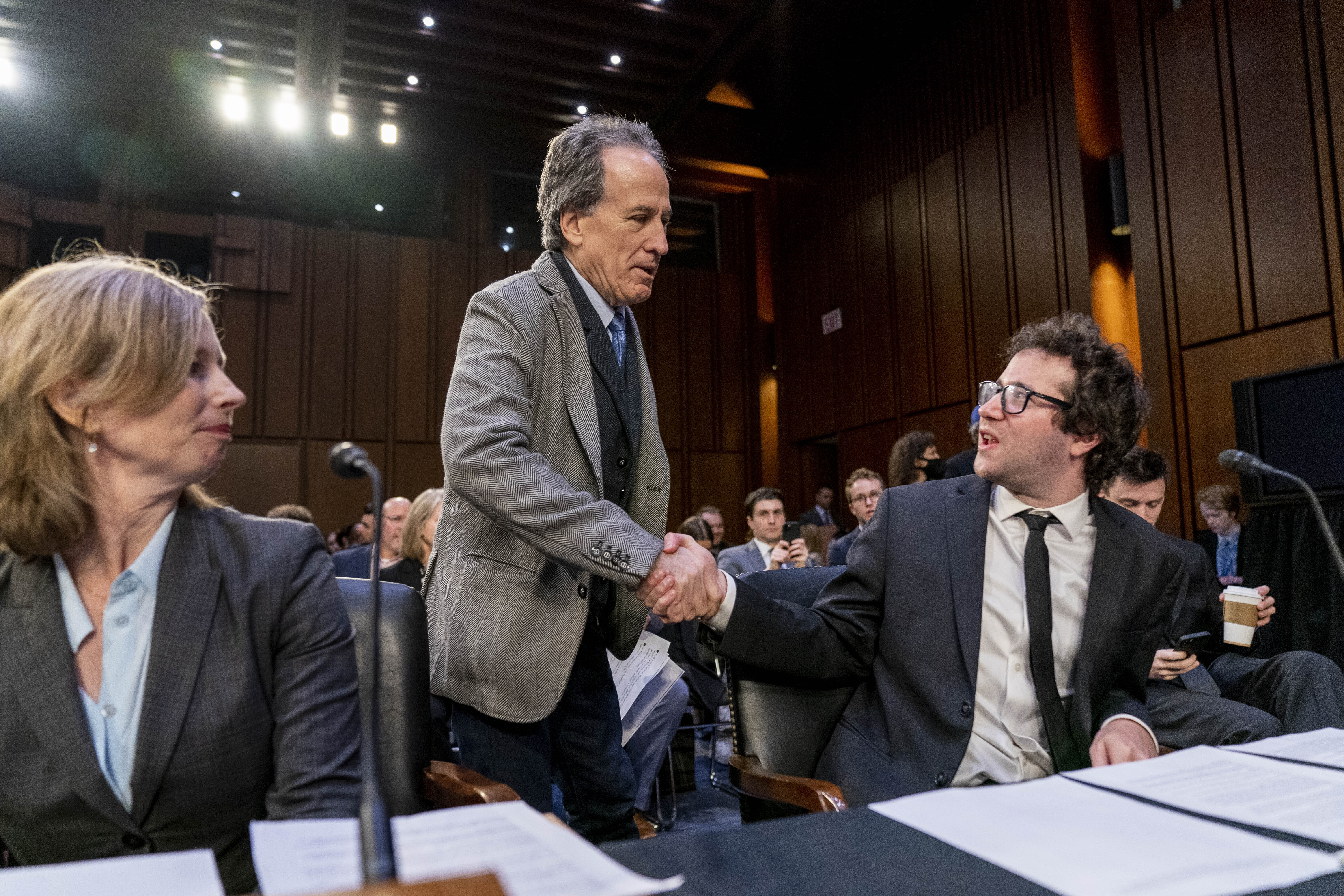 From left, American Antitrust Institute Vice President For Legal Advocacy Kathleen Bradish, Jam Productions LLC Chief Executive Officer and President Jerry Mickelson, and Singer-Songwriter Clyde Lawrence appear to testify before a Senate Judiciary Committee hearing to examine promoting competition and protecting consumers in live entertainment on Capitol Hill in Washington, Tuesday, Jan. 24, 2023. (AP Photo/Andrew Harnik)