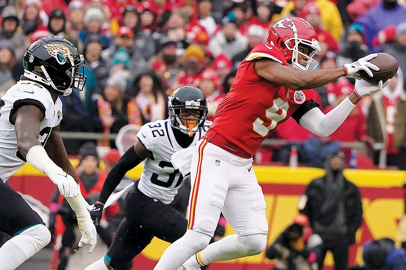 Chiefs wide receiver JuJu Smith-Schuster makes a catch during last Saturday’s divisional round playoff game against the Jaguars at Arrowhead Stadium in Kansas City. (Associated Press)