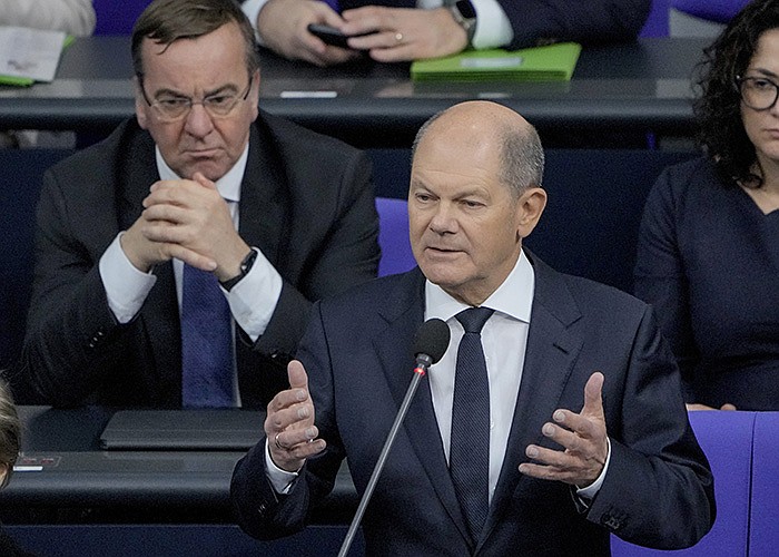 “This is the result of intensive consultations, once again, with our allies and international partners,” Chancellor Olaf Scholz told lawmakers Wednesday in Berlin in announcing the agreement to send
14 German Leopard tanks to Ukraine.
(AP/Markus Schreiber)