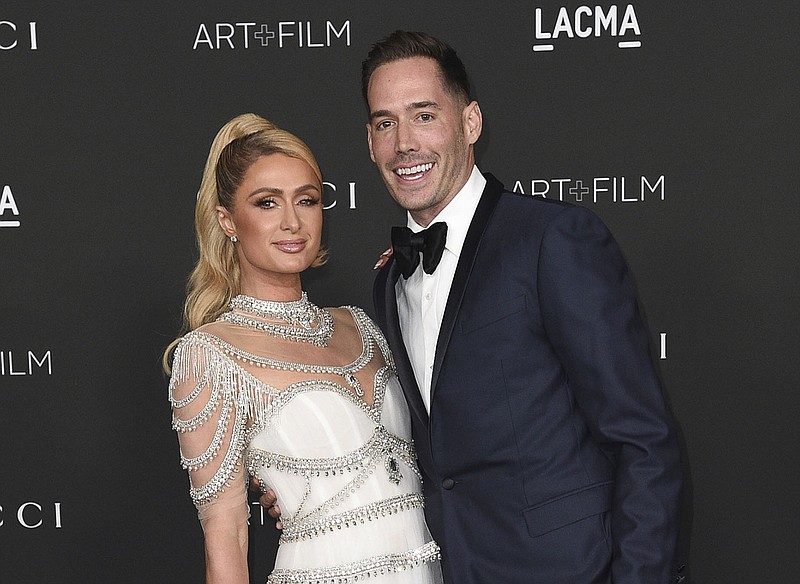 Paris Hilton, left, and Carter Reum appear at the LACMA Art + Film Gala in Los Angeles on Nov. 6, 2021. Hilton has welcomed her first child, with her husband Reum.
(Photo by Richard Shotwell/Invision/AP, File)