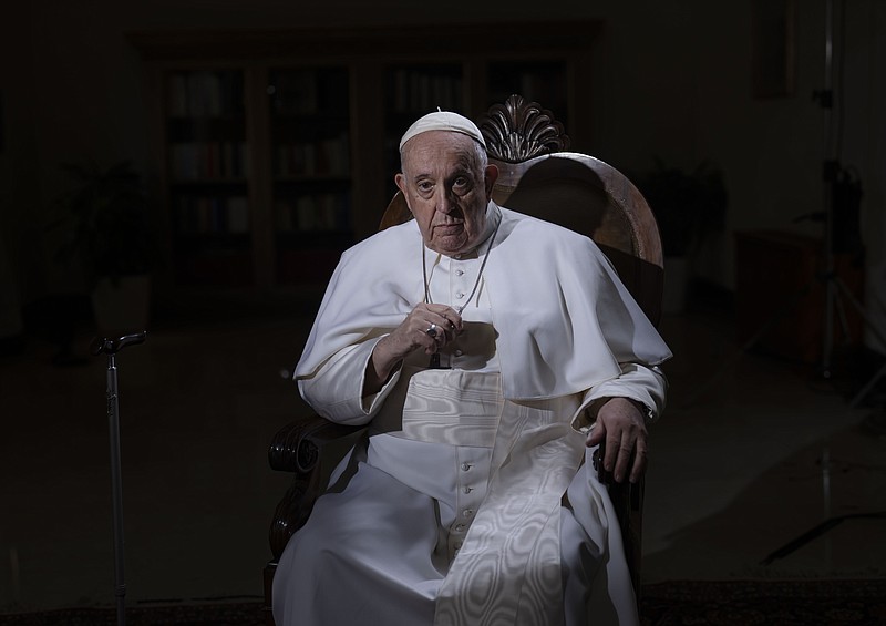 Pope Francis pauses during an interview with The Associated Press at The Vatican, Tuesday, Jan. 24, 2023. Pope Francis said he hasn't even considered issuing norms to regulate future papal resignations and says he plans to continue on for as long as he can as bishop of Rome, despite a wave of attacks against him by some top-ranked cardinals and bishops. (AP Photo/Domenico Stinellis)