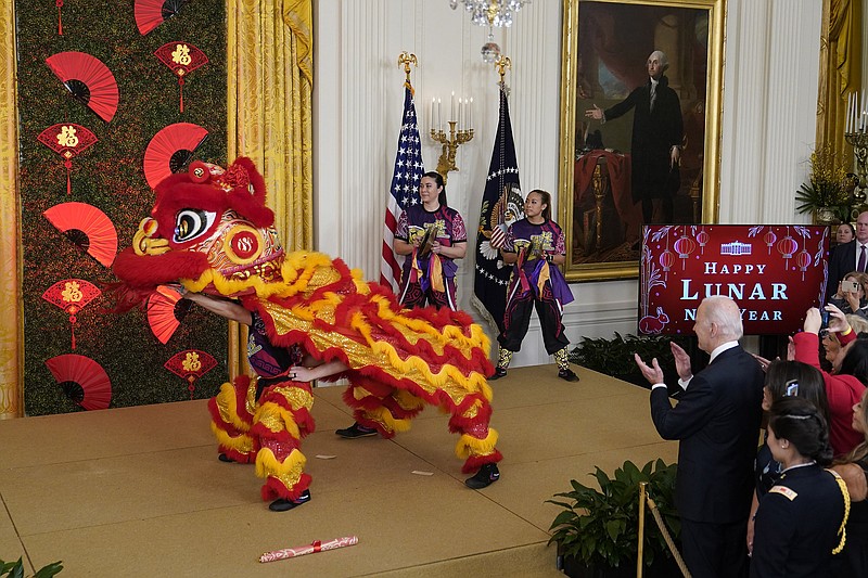 President Joe Biden and first lady Jill Biden watch a performance Thursday at the White House during a reception to celebrate the Lunar New Year.
(AP/Susan Walsh)