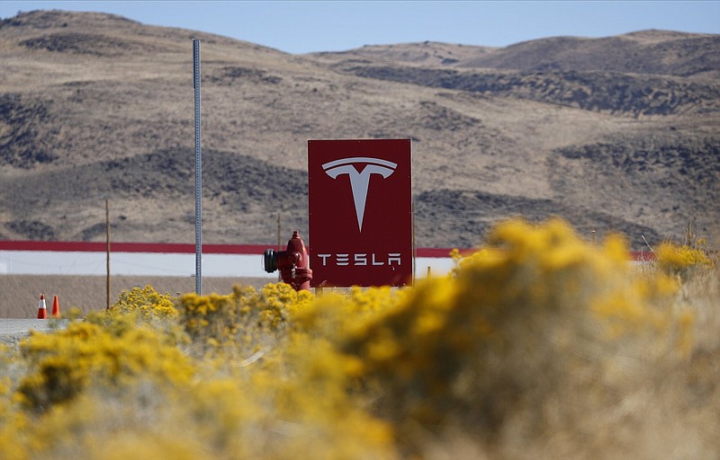 A sign marks the entrance to the Tesla Gigafactory in Sparks, Nev., in 2018.
(AP)