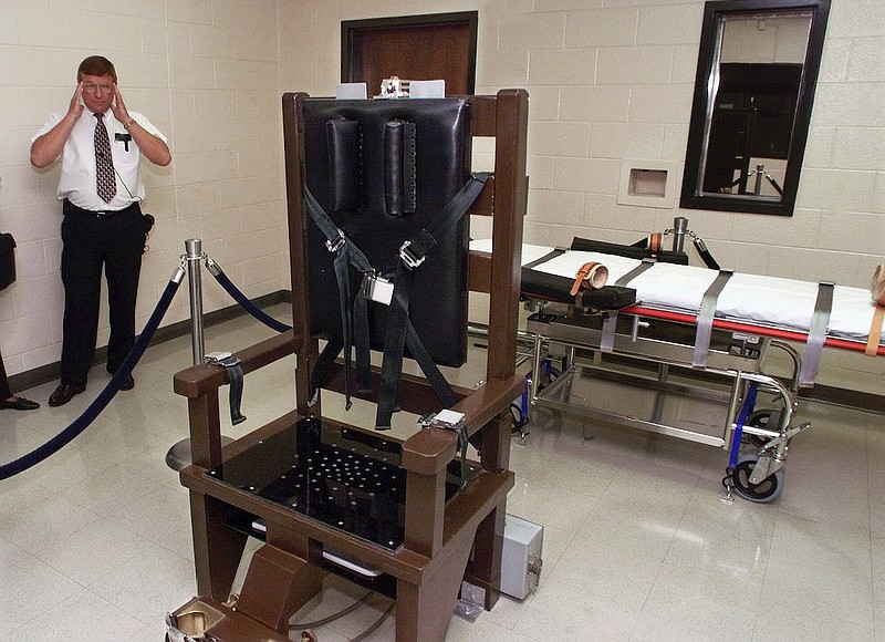 The execution chamber of the Riverbend Maximum Security Institution prison in Nashville, Tenn., is seen on Oct. 13, 1999. The Tennessee Department of Correction has fired its longtime top attorney and another employee following an independent report on failures within the state's lethal injection system. Debbie Inglis, the deputy commissioner and general counsel, and Kelly Young, the inspector general, received notices of “expiration of your executive service appointment” on Dec. 27, 2022, according to documents obtained by The Associated Press through public records requests. (AP Photo/Mark Humphrey, File)