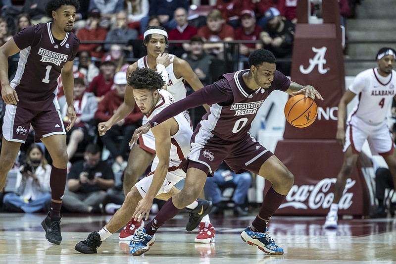 Mississippi State forward D.J. Jeffries (0) chases down a loose ball with Alabama guard Mark Sears (1) on his heels during the first half of an NCAA college basketball game, Wednesday, Jan. 25, 2023, in Tuscaloosa, Ala. (AP Photo/Vasha Hunt)
