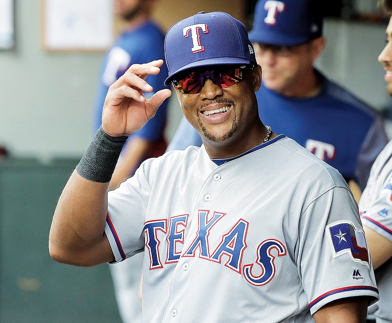 In this Sept. 30, 2018, file photo, Adrian Beltre smiles in the Rangers dugout during a game against the Mariners in Seattle. (Associated Press)