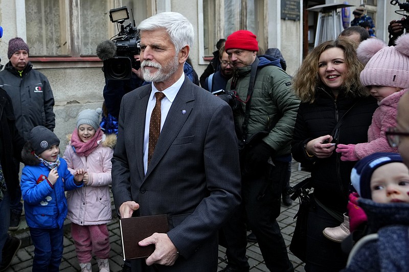 Presidential candidate and retired army Gen. Petr Pavel leaves the polling station after casting his vote during the presidential election runoff on Friday in Cernoucek, Czech Republic.
(AP/Petr David Josek)