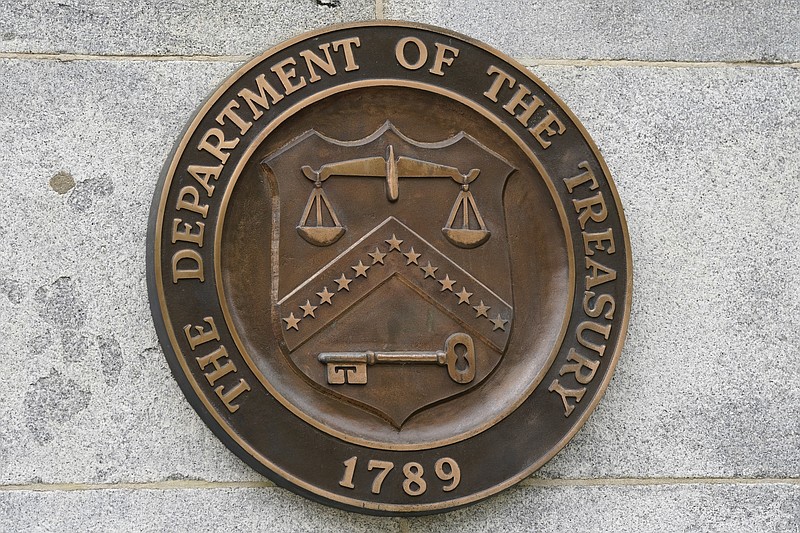 FILE - The Department of the Treasury's seal outside the Treasury Department building in Washington on May 4, 2021. (AP Photo/Patrick Semansky, File)