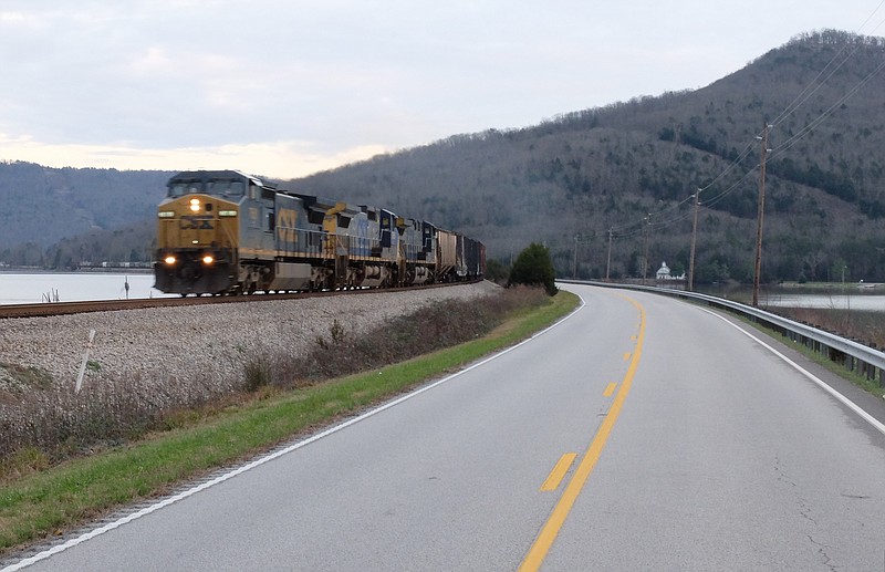 Staff photo by Tim Barber.A westbound CSX train travels near the Nickajack Dam Wednesday in this Dec. 30, 2015 photo. The Macedonia church is seen, at right.