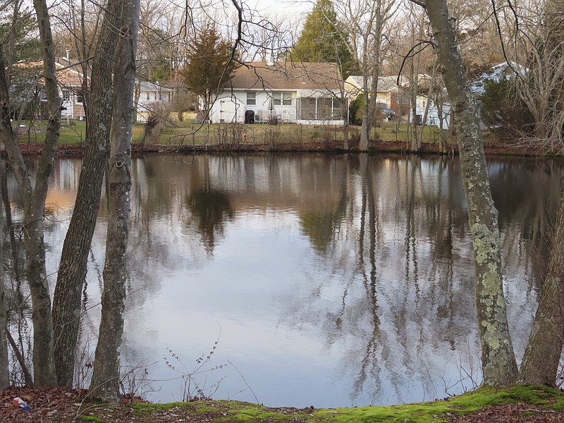 Homes in one of the residential neighborhoods closest to the former Ciba Geigy chemical plant in Toms River, N.J., are shown on Tuesday, Jan. 24, 2023. The contaminated plant area is on the Superfund list of the nation's worst toxic waste sites. A proposed settlement to restore natural resources damaged by the company's dumping is widely opposed as insufficient by residents of Toms River, where childhood cancer rates from the late 1970s through 1990s occurred at elevated rates. (AP Photo/Wayne Parry)