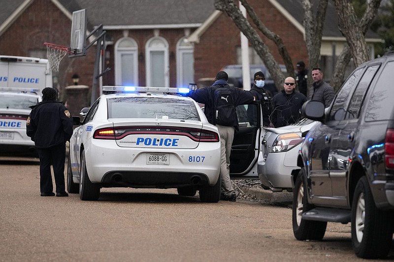 Members of the Memphis Police Department work a crime scene in Memphis, Tenn., Tuesday, Jan. 24, 2023.  Police video of the deadly beating of Tyre Nichols by officers in Memphis, Tenn. is hard to watch. The images are a glaring reminder of repeated failures of efforts to prevent such flashpoints of police brutality. (AP Photo/Gerald Herbert)