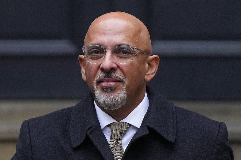 FILE - Conservative Party chairman Nadhim Zahawi leaves the Conservative Party head office in Westminster, central London, Tuesday, Jan. 24, 2023. (AP/Alastair Grant, File)