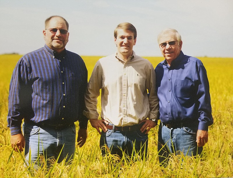 Kyle Moery, Robert Moery and Robert "Sonny" Moery on the family farm in Carlisle