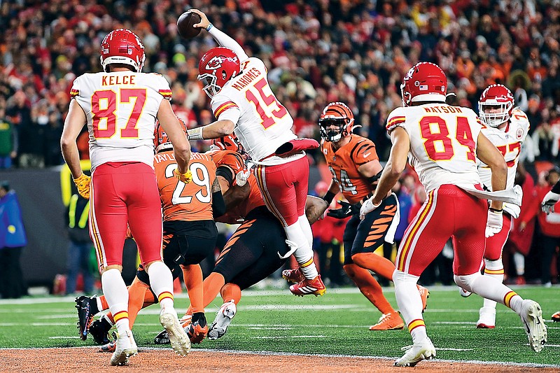 In this Dec. 4, 2022, file photo, Chiefs quarterback Patrick Mahomes carries the ball for a touchdown during a game against the Bengals in Cincinnati. (Associated Press)