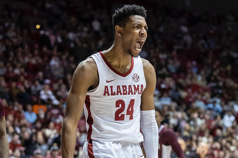 Alabama forward Brandon Miller (24) reacts to his dunk during the first half of an NCAA college basketball game against Mississippi State, Wednesday, Jan. 25, 2023, in Tuscaloosa, Ala. (AP Photo/Vasha Hunt)