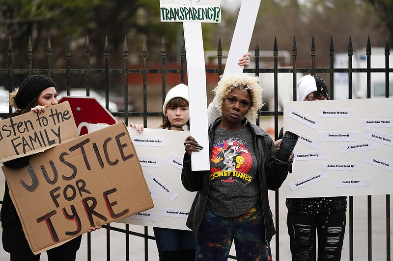 A group of demonstrators protest outside a police precinct in response to the death of Tyre Nichols, who died after being beaten by Memphis police officers, in Memphis, Tenn., Sunday, Jan. 29, 2023. (AP/Gerald Herbert)