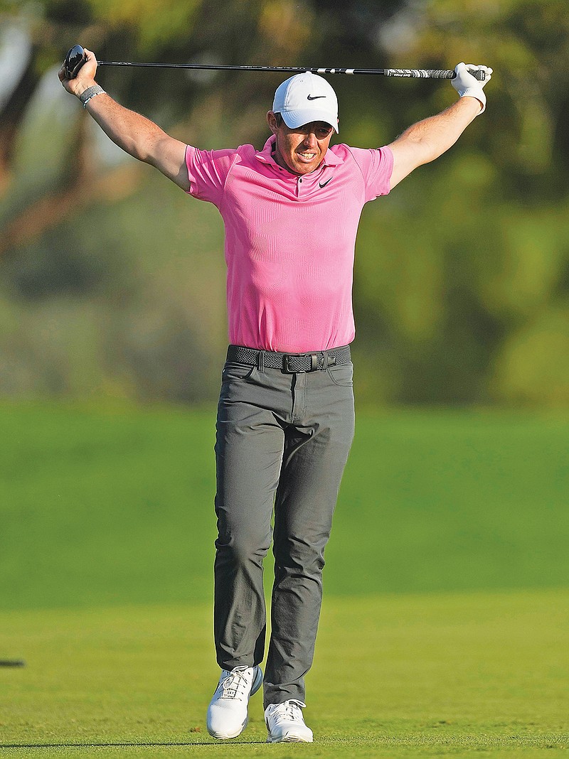 Rory McIlroy reacts after hitting his second shot on the 18th hole during Sunday's third round of the Dubai Desert Classic in Dubai, United Arab Emirates. (Associated Press)