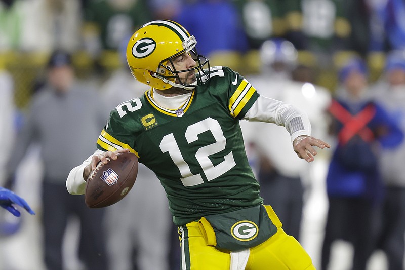 Green Bay Packers quarterback Aaron Rodgers (12) passes during an NFL football game against the Detroit Lions Sunday, Jan.8, 2023, in Green Bay, Wis. (AP Photo/Matt Ludtke)