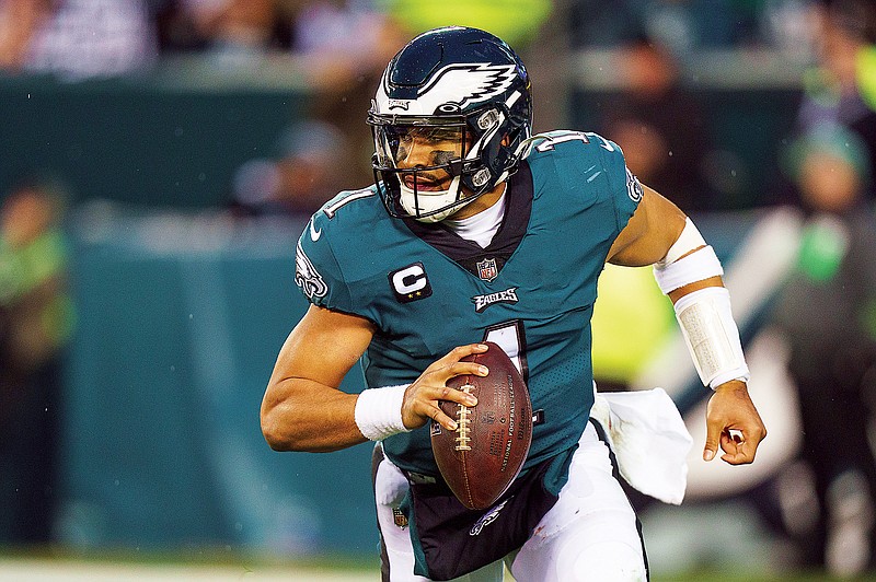 Eagles quarterback Jalen Hurts looks down the field Sunday in the NFC Championship Game against the 49ers in Philadelphia. (Associated Press)