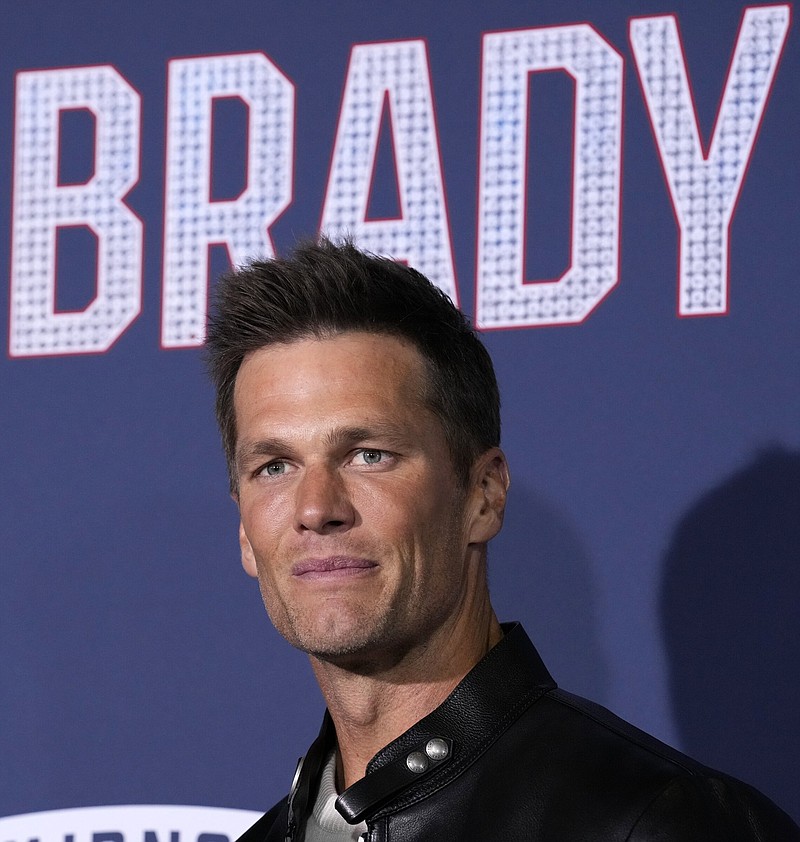 NFL quarterback Tom Brady poses at the premiere of the film "80 for Brady," Tuesday, Jan. 31, 2023, at the Regency Village Theatre in Los Angeles. Brady announced his retirement from the NFL on social media this morning. 
(AP Photo/Chris Pizzello)