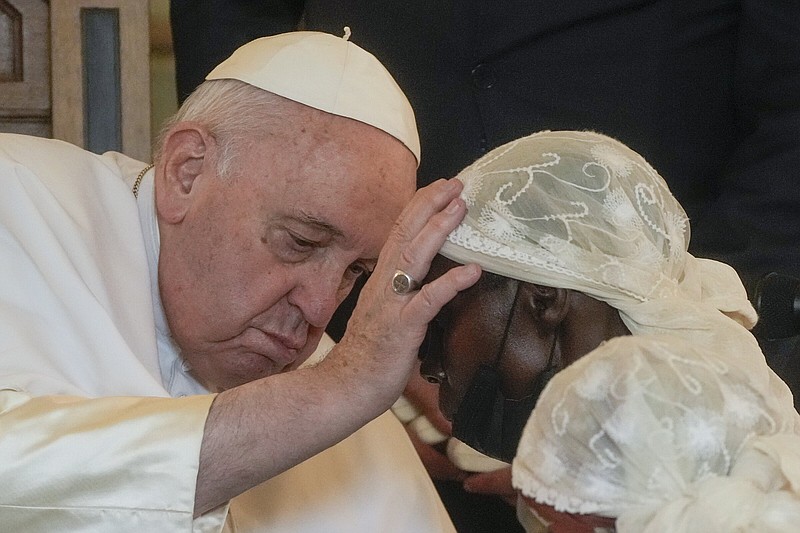 Pope Francis blesses a victim of violence on Wednesday in eastern Congo at the Apostolic Nunciature in Kinshasa, Democratic Republic of Congo. Francis is in Congo and South Sudan for a six-day trip, hoping to bring comfort and encouragement to two countries that have been riven by poverty, conflicts and what he calls a “colonialist mentality” that has exploited Africa for centuries.
(AP/Gregorio Borgia)
