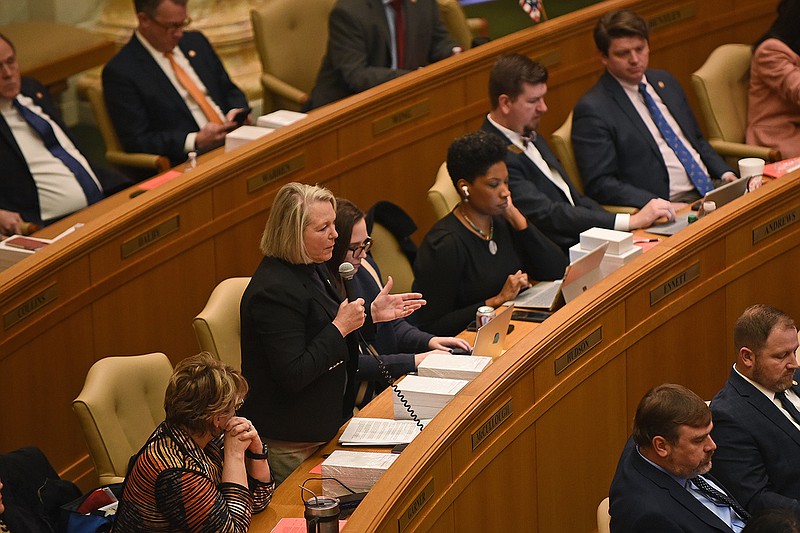 Rep. Tippi McCullough, D-Little Rock, asks a question regarding House Bill 1156 during the House session Wednesday at the state Capitol in Little Rock.
(Arkansas Democrat-Gazette/Staci Vandagriff)