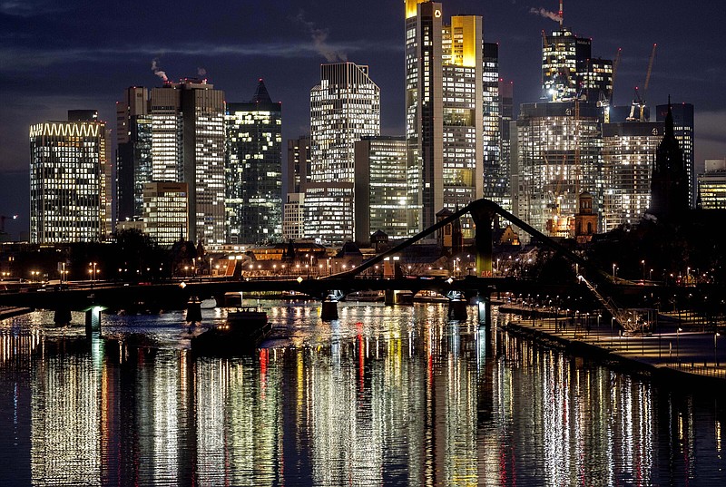 A barge on the Main River passes the banking district in Frankfurt, Germany, in this file photo.
(AP/Michael Probst)