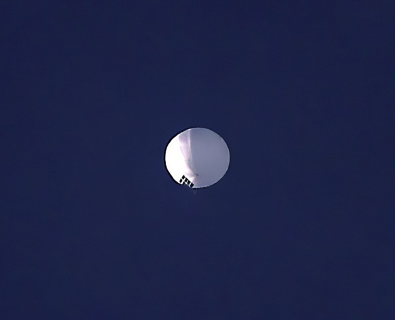 A high-altitude balloon floats over Billings, Mont., on Wednesday. The Pentagon would not confirm that the balloon in the photo was the Chinese surveillance balloon it has been tracking.
(AP/The Billings Gazette/Larry Mayer)