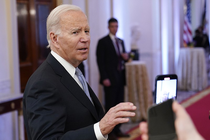 FILE - President Joe Biden talks with reporters after speaking in the East Room of the White House in Washington, Jan 20, 2023. (AP Photo/Susan Walsh, File)