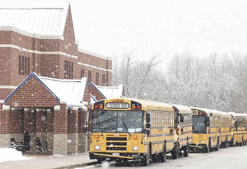 Jefferson City School District buses line up at Thomas Jefferson Middle School in this Jan. 29, 2020, photo. (News Tribune file photo)