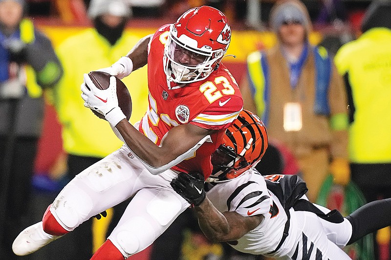 Chiefs cornerback Joshua Williams intercepts the ball during Sunday night’s AFC Championship Game against the Bengals at Arrowhead Stadium in Kansas City. (Associated Press)