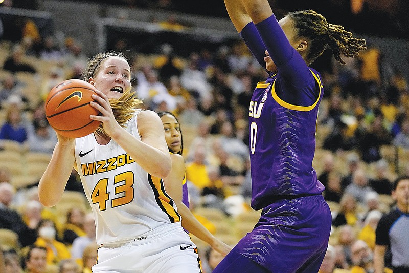 Missouri's Hayley Frank gets ready to shoot against LSU's LaDazhia Williams during last month's game at Mizzou Arena in Columbia. (Associated Press)