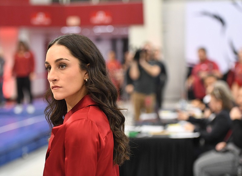 Arkansas coach Jordyn Wieber watches Friday, Jan. 13, 2022, during the Razorbacks' meet with Alabama in Barnhill Arena in Fayetteville. 
(NWA Democrat-Gazette/Andy Shupe)