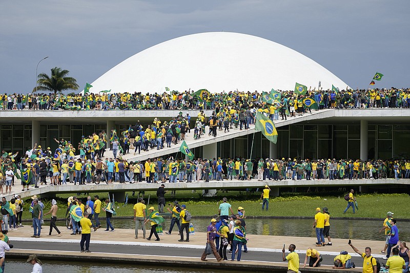 Protesters, supporters of Brazil’s former President Jair Bolsonaro, storm the the National Congress building in Brasilia, Brazil, last month.
(AP/Eraldo Peres)